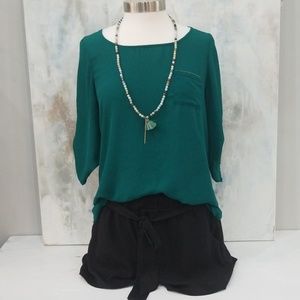 Emerald green silk blouse